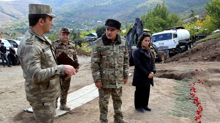 İşğaldan azad olunmuş ərazilərdə kütləvi məzarlıqlar aşkar edilib<font color=red> - FOTOLAR</font>