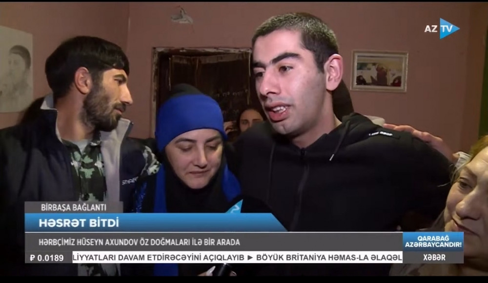 Əsirlikdən azad edilən Aqşin Bəbirov və Hüseyn Axundov ailələrinə qovuşublar<font color=red> - FOTOLAR</font>