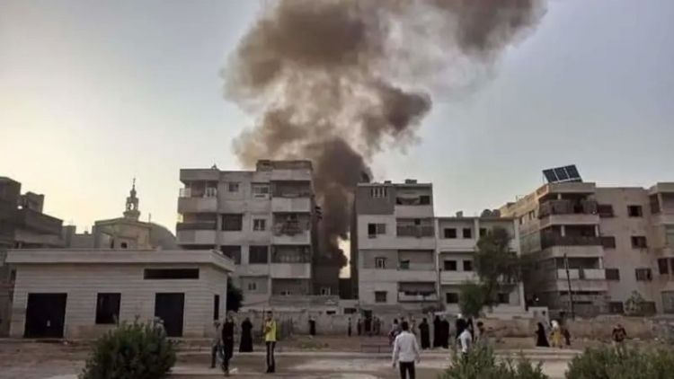 Suriyada hərbi helikopter yaşayış binalarının üzərinə düşüb
