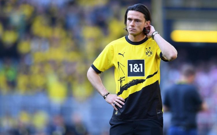 "Borussiya" məişət zorakılığında ittiham olunan futbolçunun müqaviləsini ləğv edib