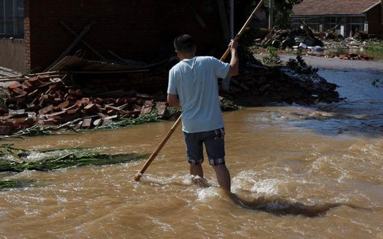 Çinin şimalında daşqın nəticəsində 10 nəfər həlak olub, 2 nəfər itkin düşüb